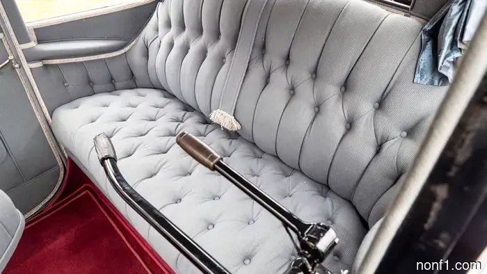 This 1918 Detroit Electric is equipped with contemporary batteries, and it functions properly.