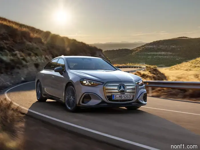 The full dashboard display of the Mercedes C-Class electric vehicle boasts an elegance that is reminiscent of a Dave & Buster's.