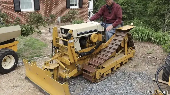 DIY Enthusiast Constructs Ultimate Chore Fleet Using a Mini Bulldozer and Road Grader Built from Lawn Tractors