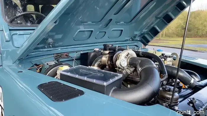 Use Your Tax Refund to Purchase a Backhoe-Engined Land Rover Defender