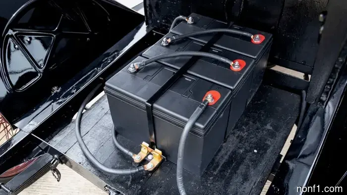 This 1918 Detroit Electric is equipped with contemporary batteries, and it functions properly.