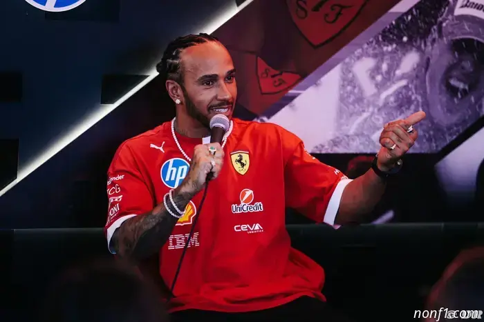 Hamilton refutes claims of a disagreement with a Ferrari engineer.