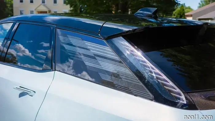 Cadillac Could Have Opted for a $2 Sticker on the Optiq, but It Decided to Etch Glass Instead.