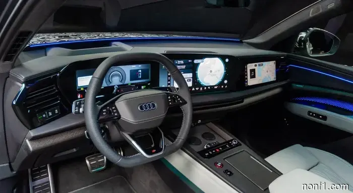 El Audi Q9 Flagship 2027 tiene portavasos lo suficientemente grandes para un Stanley y un sistema de sonido que vibra tu asiento.