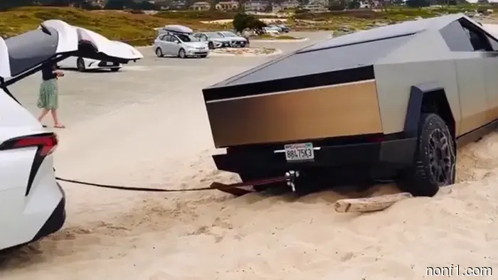 Minivan Comes to the Rescue: A Rental-Spec Sienna Pulls Out a Stuck Cybertruck from the Beach
