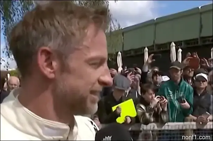 Jenson Button enthusiastically took the wheel of the Brawn GP at Goodwood.