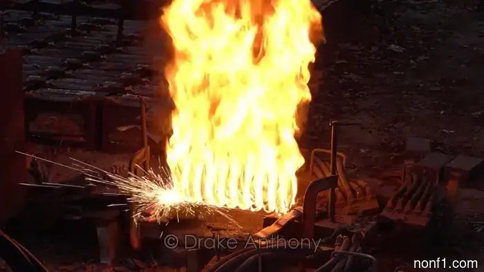 Observe the electrical current from 400 car batteries ignite a suspension spring.