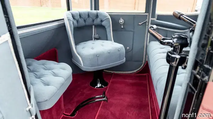 This 1918 Detroit Electric is equipped with modern batteries and is fully operational.