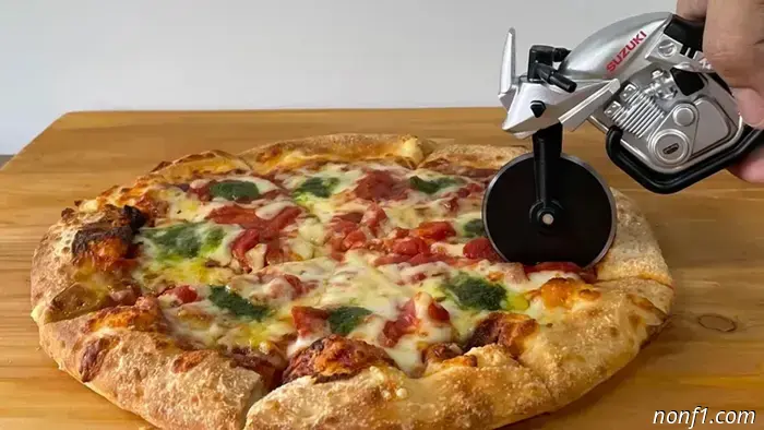 The Suzuki Motorcycle Pizza Cutter is the essential item your kitchen needs.