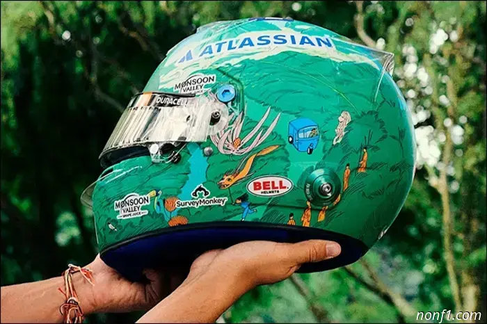 Elbon unveiled the helmet's paint scheme for the UNICEF auction.