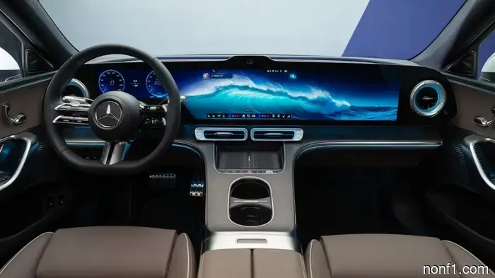 The full dashboard display of the Mercedes C-Class electric vehicle boasts an elegance that is reminiscent of a Dave & Buster's.