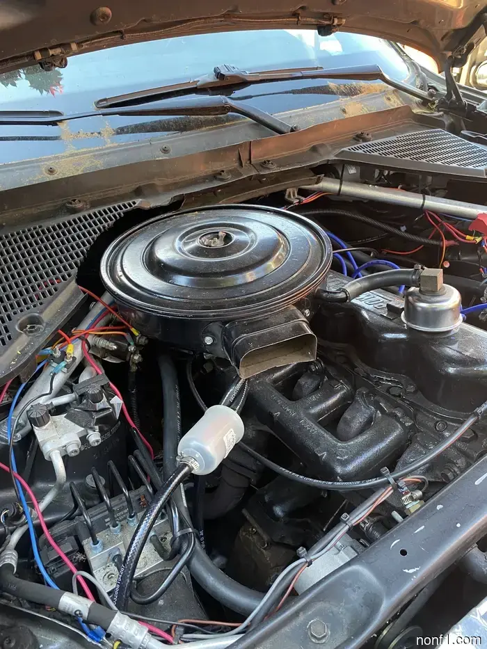Issue Resolved: Backyard Mechanic Replaces Defective BMW X5 Engine with Vintage Ford I6
