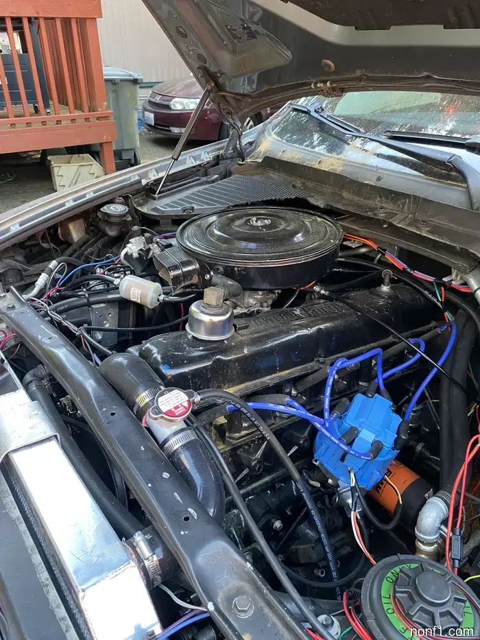 Issue Resolved: Backyard Mechanic Replaces Defective BMW X5 Engine with Vintage Ford I6