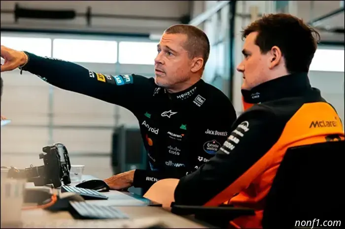 Brad Pitt gets behind the wheel of a McLaren in Austin