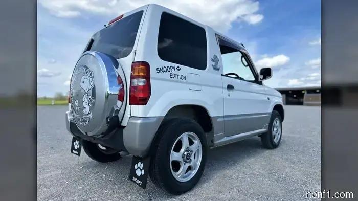 This Mitsubishi Pajero Mini is a factory JDM Snoopy Edition.