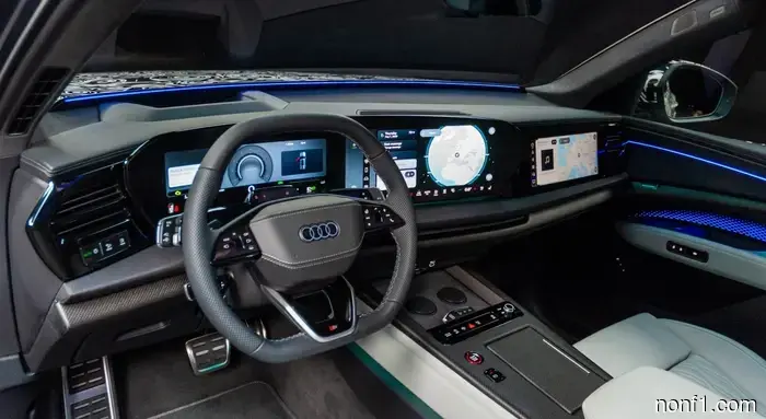 El Audi Q9 Flagship 2027 tiene portavasos lo suficientemente grandes para un Stanley y un sistema de sonido que vibra tu asiento.